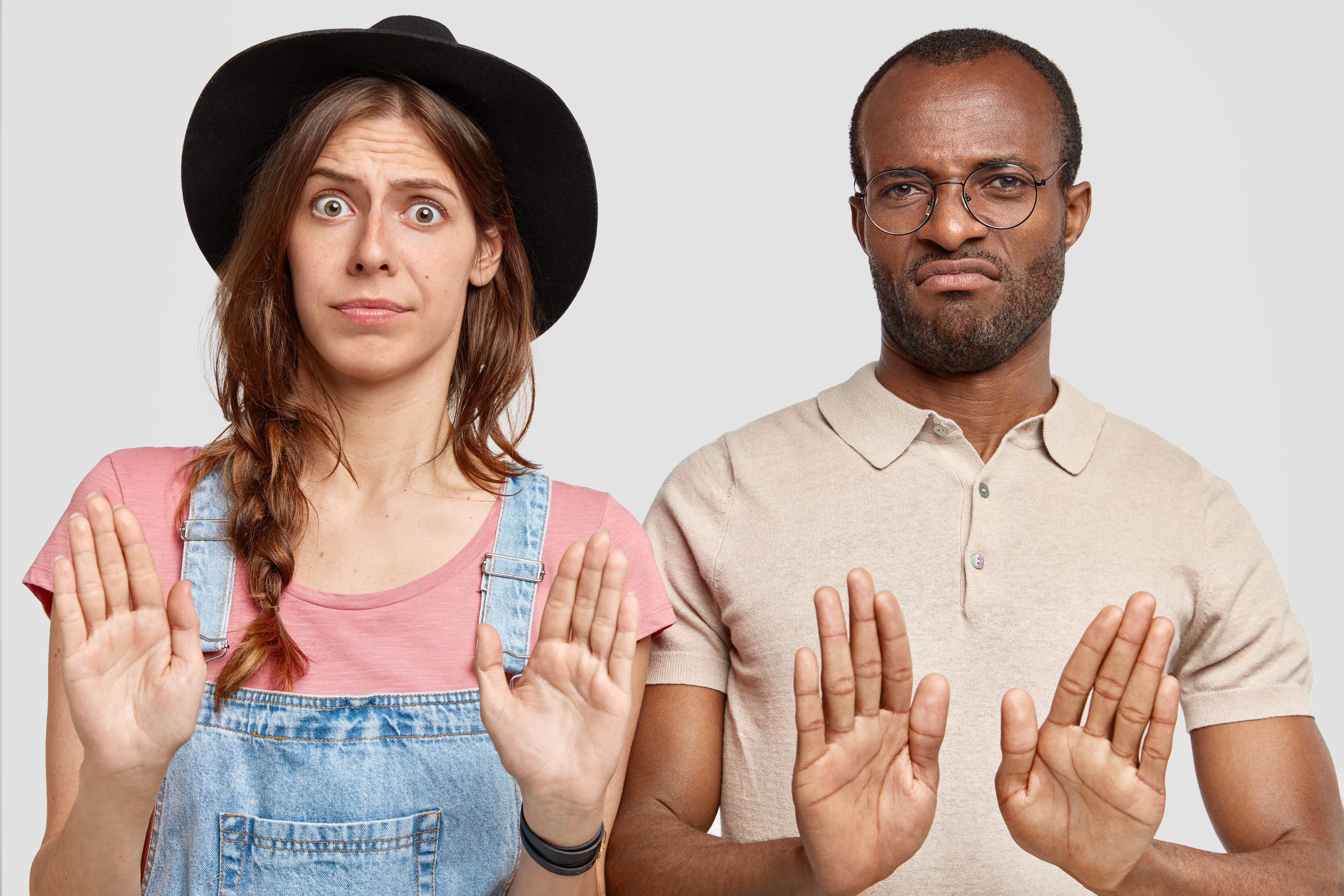 Two customer retention strategists pushing people away